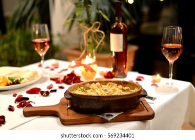 Romantic Dinner With Food And Vine Setting