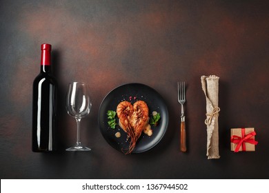 Romantic Dinner With Heart-shaped Shrimps And Wine On A Brown Background. Top View With Copy Space.