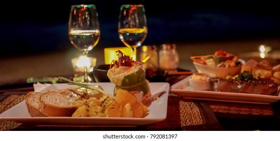 Romantic dinner on the beach, escape from reality.