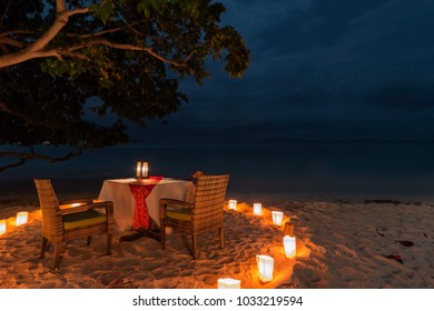 Romantic dinner on a beach of Phi Phi Don Island in Krabi, Thailand - Shutterstock ID 1033219594