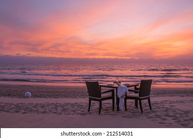 Romantic Dinner On The Beach With Sunset