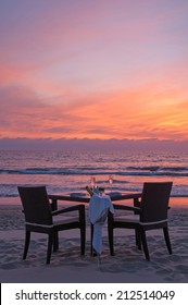 Romantic Dinner On The Beach With Sunset