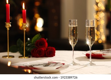 Romantic Dinner Table Setting With Glasses Of Champagne In Restaurant