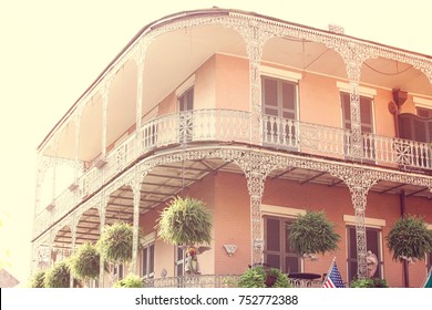 Romantic French Quarter Building In New Orleans With Wrought Iron Balcony