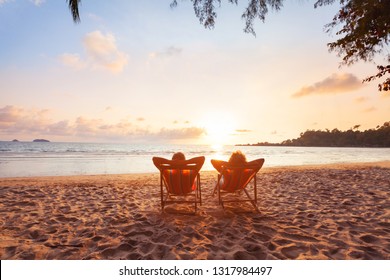 Romantic Getaway For Couple, Beach Honeymoon Travel, Silhouettes Of Man And Woman Relaxing In Hotel