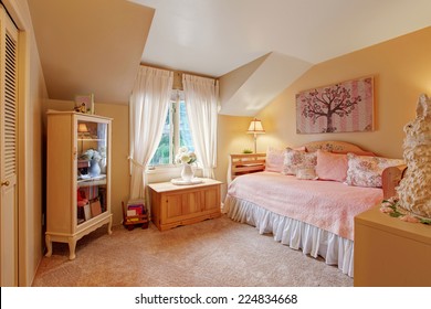 Romantic Girls Bedroom Interior In Soft Tones. Cozy Bed With Light Pink Bedding, Cabinet And Nightstand With Fresh Flowers