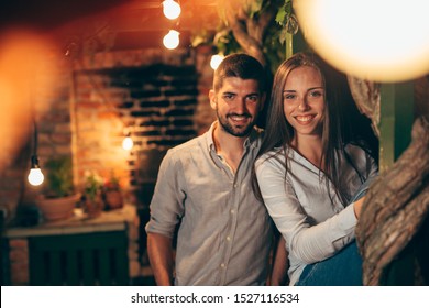 Romantic Happy Couple Posing Outdoor In Backyard, Night Scene