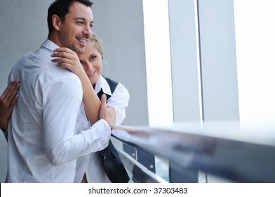 Romantic Happy Couple Relax And Have Fun At Balcony In Their New Home Apartment