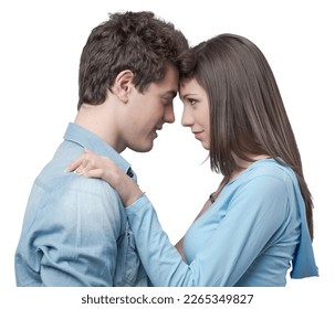 Romantic happy couple touching foreheads and staring at each other's eyes - Shutterstock ID 2265349827