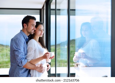 Romantic Happy Young Couple Relax At Modern Home Indoors