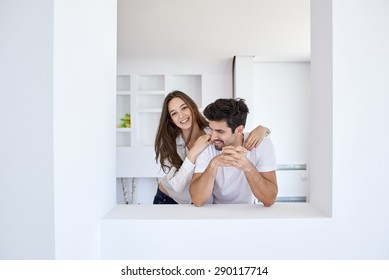 romantic happy young couple relax at modern home staircase indoors - Powered by Shutterstock