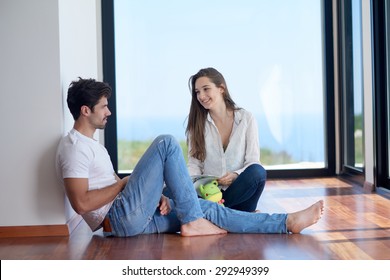 romantic happy young couple relax at modern home staircase indoors - Powered by Shutterstock