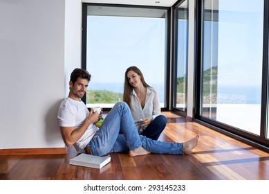 romantic happy young couple relax at modern home staircase indoors - Powered by Shutterstock