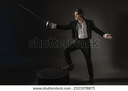 The romantic hero is a duelist in a dynamic fighting stance, the style of classical theatrical productions