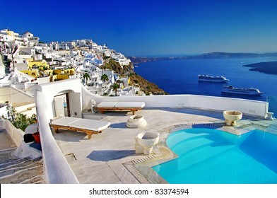 romantic holidays - luxury Santorini resorts. Gorgeous view from swimming pool. Greece travel