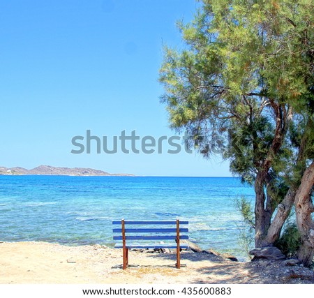 Romantic and iddyic resting place by the ocean; amazing view over the mediterranean sea with a little bench just at the right place for some shade under a tree. 
