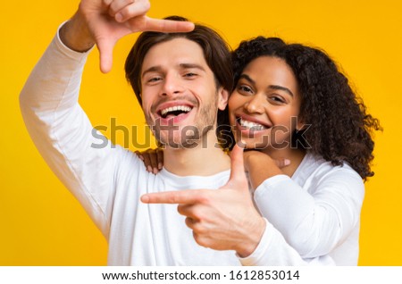 Similar – Image, Stock Photo Two teenagers race through the sunshine on a sled, dusted with snow
