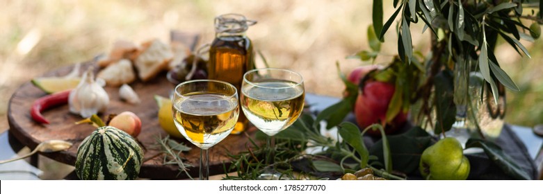 Romantic Italian Lunch Outside For A Couple: Copper Pan With Delicious And Spicy Fried Shrimps With Herbs And Garlic, Wine, Bread, Olives. Bottle Of Olive Oil. Luxury Lifestyle, Gourmet Food. Banner