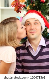 Romantic Kiss Under Mistletoe