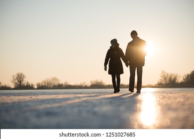 Romantic Love Couple Outdoor At Winter Landscape, Sunset View.