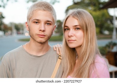 Romantic Love Couple Of Teenage Girl And Boy 17-18 Year Old Together Outdoor. Happy Teenagers Smiling. 