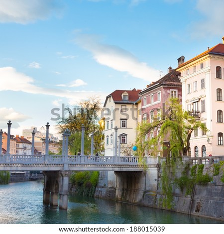 Romantic medieval Ljubljana's city center, the capital of Slovenia, Europe. Gallus bank of river Ljubljanica with Cobblers' Bridge or the Shoemakers' Bridge. Stock photo © 