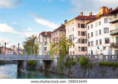 Romantic medieval Ljubljana's city center, the capital of Slovenia, Europe. Gallus bank of river Ljubljanica with Cobblers' Bridge or the Shoemakers' Bridge. Stock photo © 