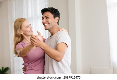 Romantic Middle Age Couple At Home. Happy Loving Husband And Wife Are Enjoying Spending Time Together While Dancing In Living Room. Love, Enjoying Tender Moment, Joyful Lifestyle.