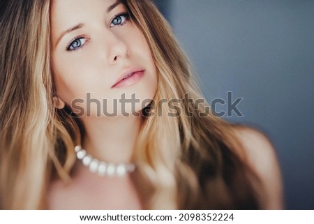 Romantic model look and aesthetic beauty face closeup. Beautiful woman with blonde hair, long hairstyle and natural makeup as classic glamour style and fashion portrait.