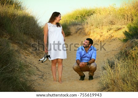 Romantic moments between a couple at the beach