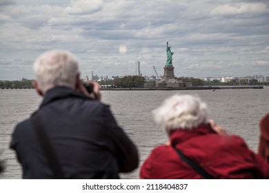 A Romantic Old Couple Shoots The Statue Of Liberty From The The Staten Island Ferry - Street Photography From New York City - Postcard Form NYC