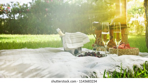 Romantic picnic at the park on a grass - Powered by Shutterstock