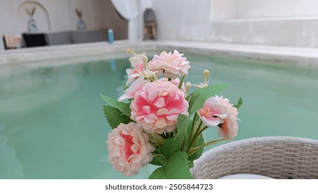 Romantic Poolside Scene with Pink Roses and Floating Breakfast - Powered by Shutterstock