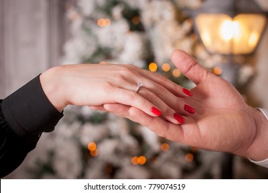 Romantic proposal to a woman - Christmas magic, winter love. - Powered by Shutterstock