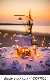 Romantic Set Up Dinner Set On The Beach.(Selective Focus)