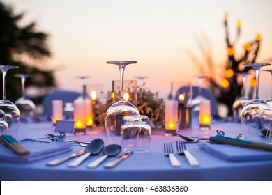 Romantic Set Up Dinner Set On The Beach.(Selective Focus)