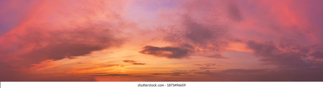 Romantic Sky With Clouds At Sunset. Dramatic Cloudscape Panorama.