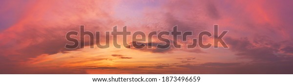 Romantic sky with clouds at sunset. Dramatic\
cloudscape panorama.