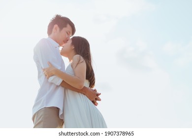 romantic time loving couple kissing on the beach. Love travel concept.