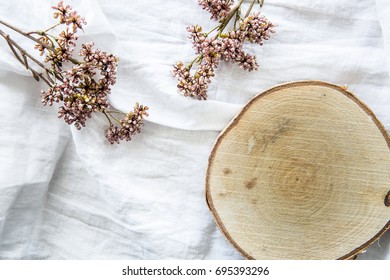 romantic tree slice with flowers

