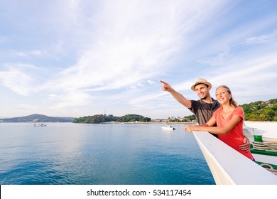 Romantic Vacation. Young Loving Couple Enjoying View On Cruise Ship Deck. Sailing The Sea.