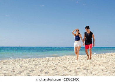 Romantic Walk In Couple At The Beach