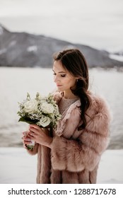 Romantic Wedding Moment, Bride Portrait, Bride Posing Near The Lake. Winter Wedding