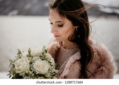 Romantic Wedding Moment, Bride Portrait, Bride Posing Near The Lake. Winter Wedding