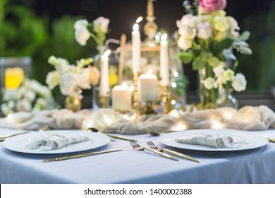 Romantic Wedding Table Top Layout Table Spread No People Tropical Location With Gold Cutlery At Night Evening Event
