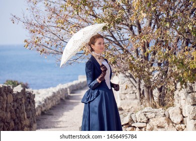 Romantic Young Beautiful Lady Outdoors. Victorian Style Vintage