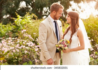 Romantic Young Couple Getting Married Outdoors