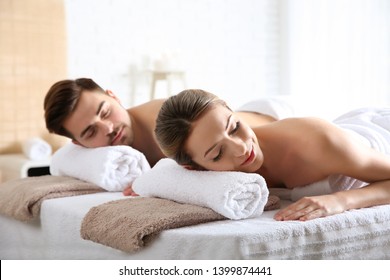 Romantic young couple relaxing in spa salon - Powered by Shutterstock