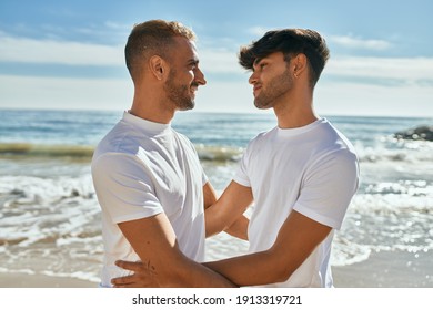 Romantic Young Gay Couple At The Beach.