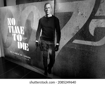 Rome, 24 November 2021: Promotional poster in a Roman cinema of the 25th 007 film with Daniel Craig NO TIME TO DIE, dated April 2020, but postponed for several months due to covid 19